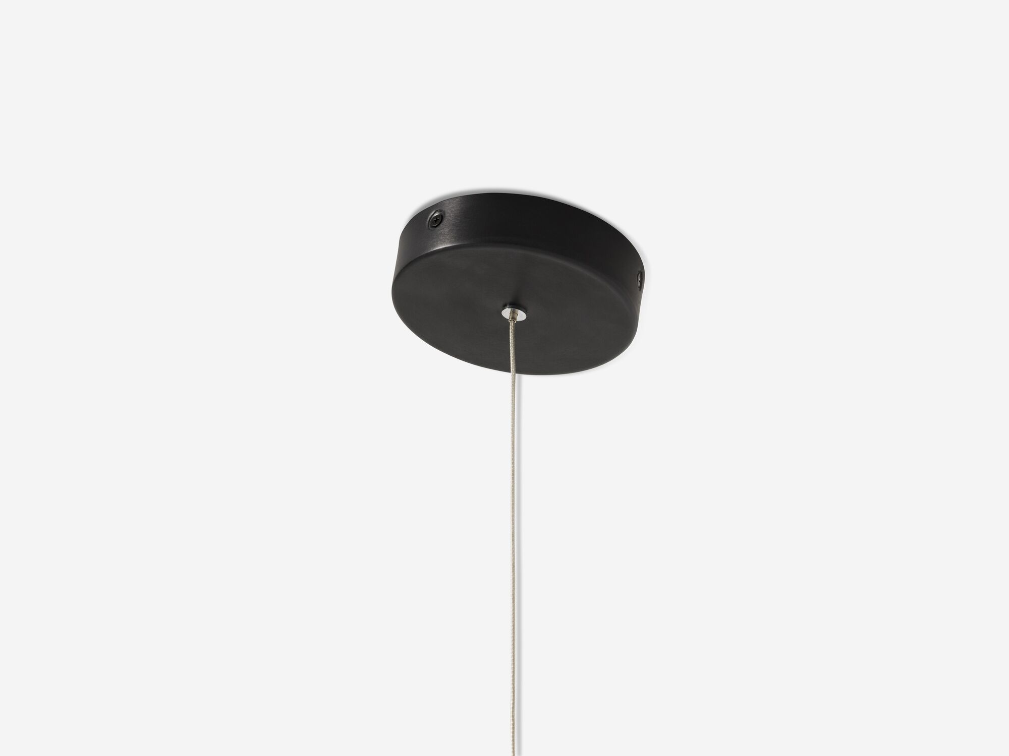 Detail view of black rounded pendant lamp base
